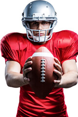 Portrait of determined American football player holding ball © vectorfusionart
