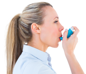 Pretty blonde using an asthma inhaler