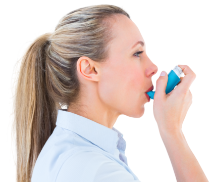 Pretty blonde using an asthma inhaler