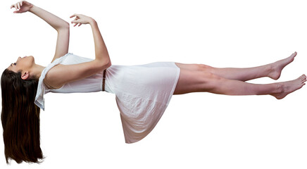 Girl in white dress floating in air