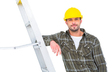 Smiling handyman in overalls leaning on ladder 