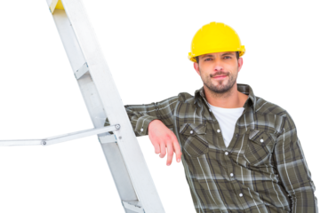 Smiling handyman in overalls leaning on ladder