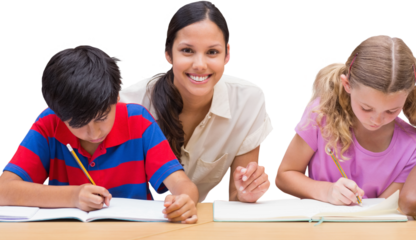 Pretty teacher helping pupils in library