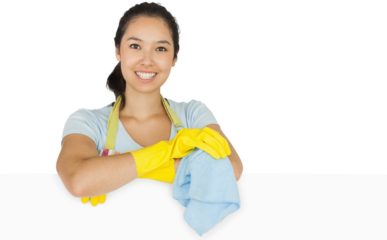 Smiling woman leaning on white surface