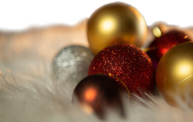 Colored Christmas ornaments on carpet