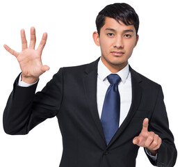 Unsmiling businessman holding and pointing