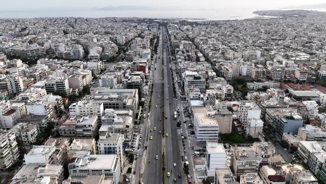 Aerial drone video of landmark buildings in Syggrou Avenue urban cityscape, Athens centre, Attica, Greece
