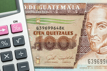 Calculator and 100 quetzales banknote, Money Guatemala, Financial concept, close up