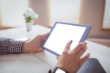 Cropped image of businesswoman using her tablet