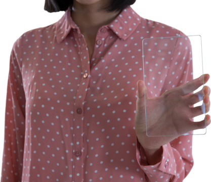 Mid section of female executive holding a glass smartphone