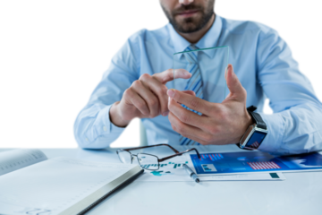 Midsection of businessman using glass sheet