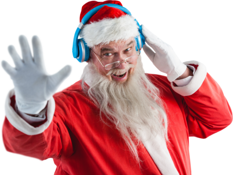 Portrait of Santa Claus listening to music on headphones
