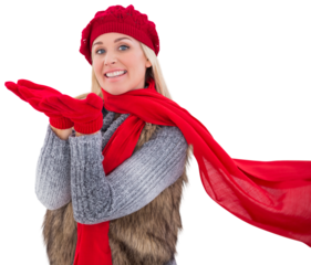 Blonde in winter clothes with hands out