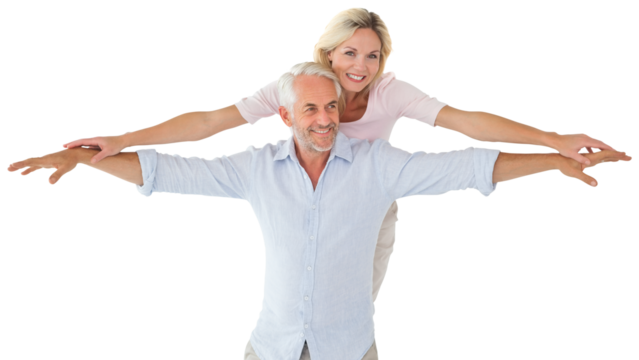 Smiling couple with arms outstretched