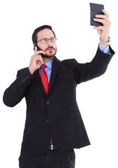Businessman holding calculator while talking on phone