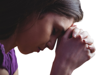 Close up of woman praying with hands together
