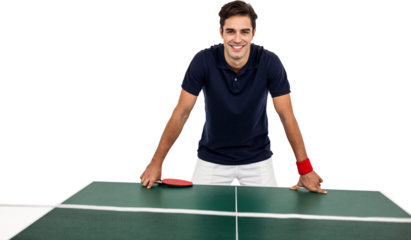 Confident male athlete leaning on hard table