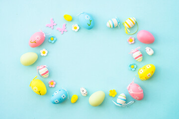 Easter background on blue. Holiday decorations with copy space.