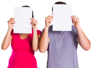 Couple covering faces with paper