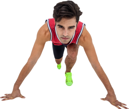 Portrait of male athlete in ready to run position