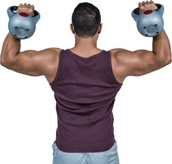 Rear view of a muscular man lifting kettlebells