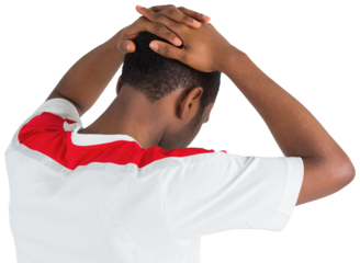 Disappointed football fan looking down