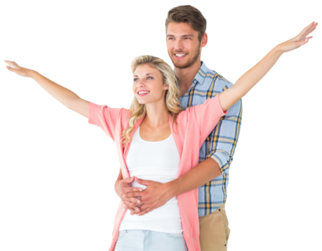 Attractive young couple smiling and embracing