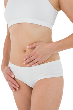 Fit woman with stomach pain