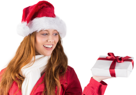 Festive redhead holding a gift