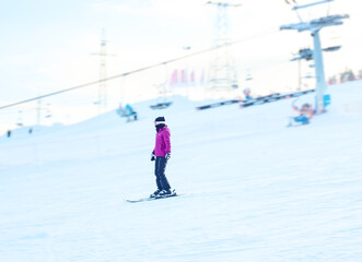 Skier on a slope - 588466616