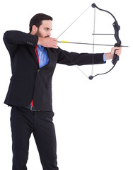 Focused businessman shooting a bow and arrow