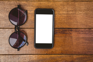 View of glasses and a smartphone