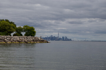 A view of Lake Ontario from a cottage. Peaceful summer sky and blue water.