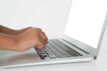 Schoolboy using laptop