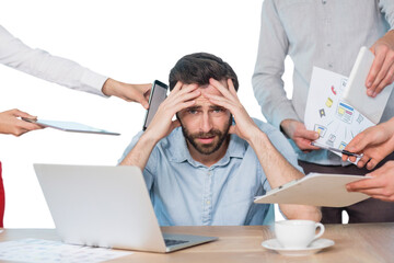 Obraz premium Portrait of frustrated businessman with colleagues at desk