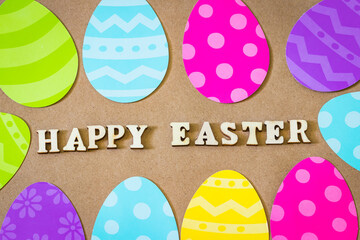 Happy Easter Text on a Brown Easter Background with colorful paper eggs