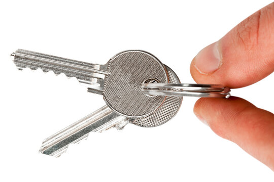 Finger holding set of keys