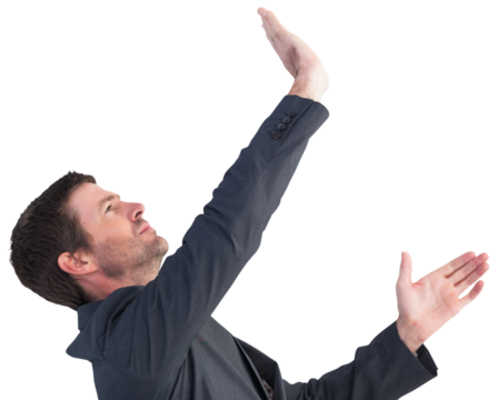 Businessman in suit pushing with hands - Powered by Adobe
