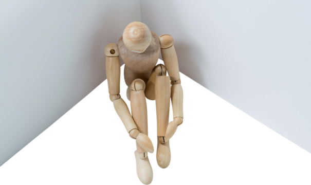 3d image of wooden figurine sitting by board  - Powered by Adobe