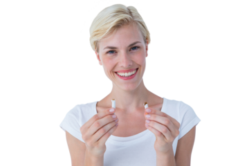 Attractive blonde woman snapping cigarette and smiling at camera