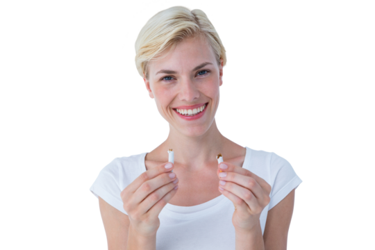 Attractive blonde woman snapping cigarette and smiling at camera