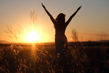 silhouette of a girl at sunset