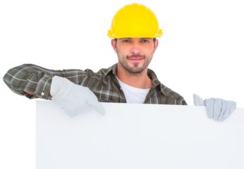 Handyman holding and pointing at blank board 