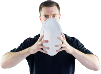 Rugby player holding a rugby ball