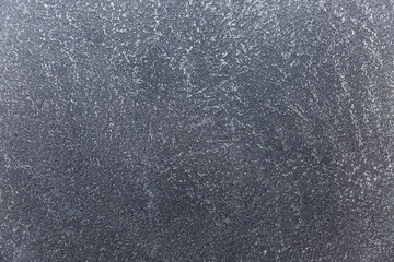 Texture of gray painted decorative wall. Modern trends in interior design, construction and renovation. Space for text.