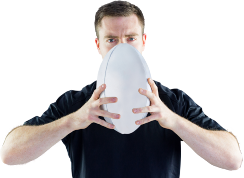 Rugby player holding a rugby ball
