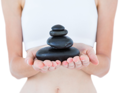 Fit woman holding stones 