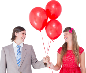 Smiling geeky couple holding red balloons