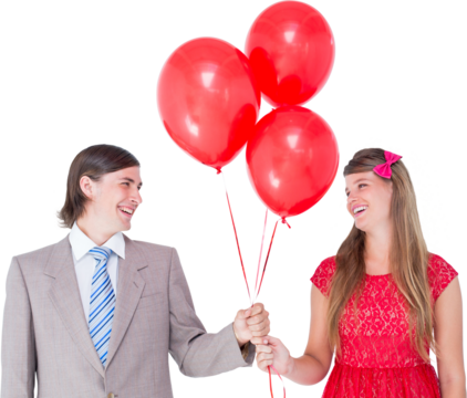 Smiling geeky couple holding red balloons