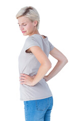 Fototapeta premium Blonde woman suffering from back pain